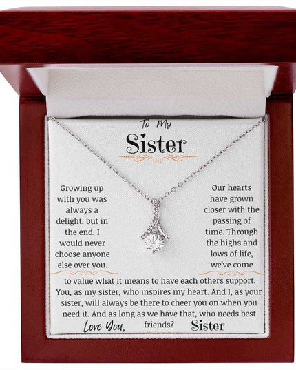 a white gold alluring beauty necklace in a mahogany box