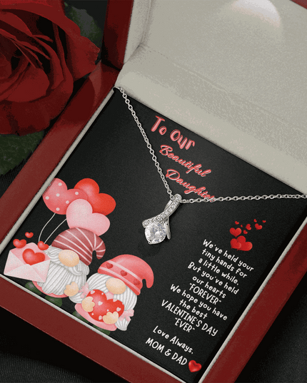 white gold alluring beauty necklace in a luxury box angled right with a rose