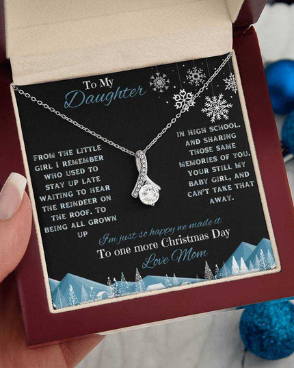 white gold alluring beauty necklace in luxury box in model's hand