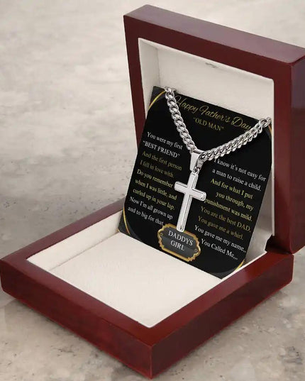 Cuban Chain Necklace on table in a mahogany box angled to right.