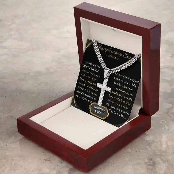 Cuban Chain Necklace on table in a mahogany box angled to right.