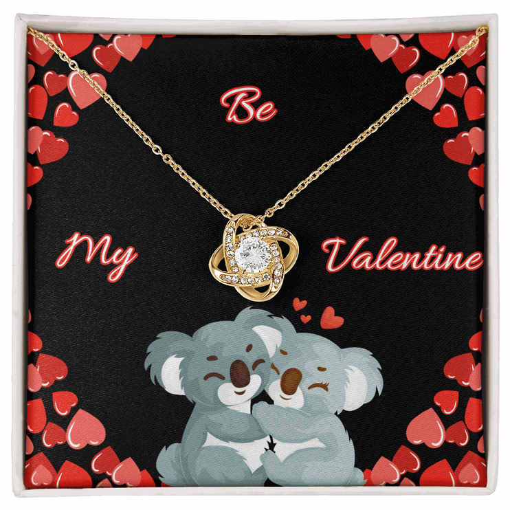 18k gold love knot necklace in soft box with greeting card