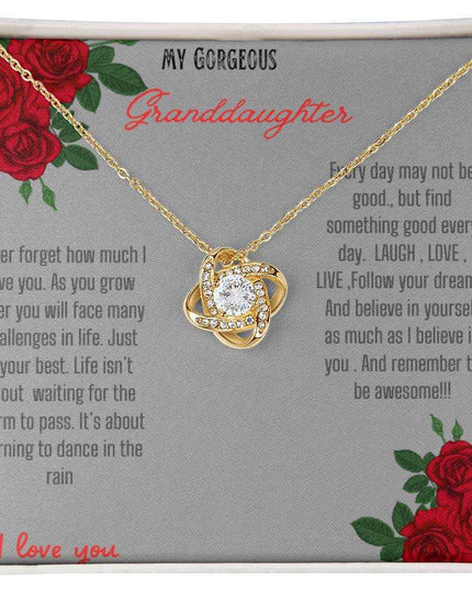 Love Knot Necklace with a yellow gold love knot in a two-tone box