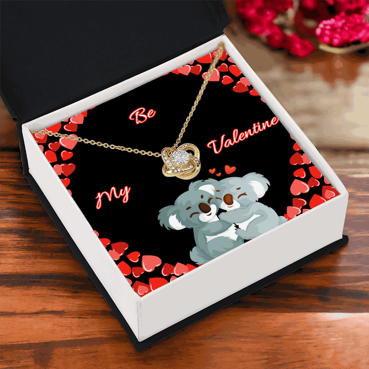 18k gold love knot necklace in a soft box