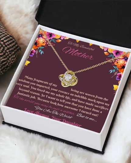yellow gold love knot necklace in soft box