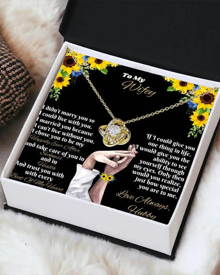 yellow gold love knot necklace in two-tone box angle right