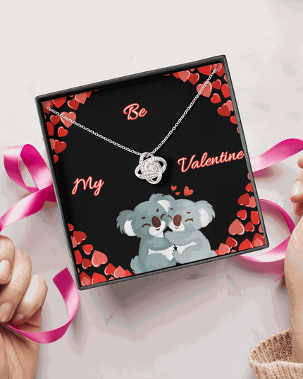 14k white gold love knot necklace in soft box with greeting card gift wrapped