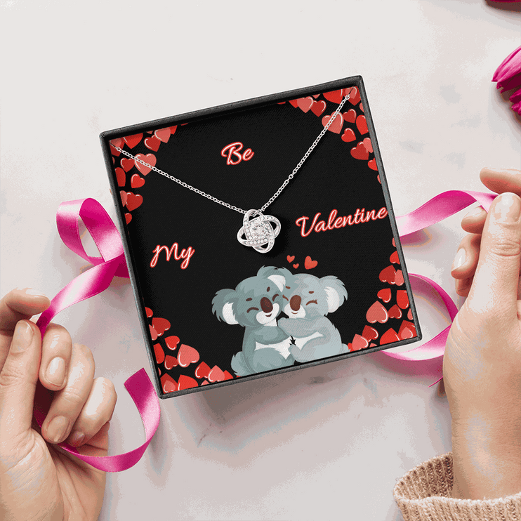 14k white gold love knot necklace in soft box with greeting card gift wrapped