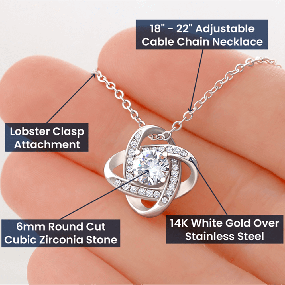 white gold love knot necklace product details up close