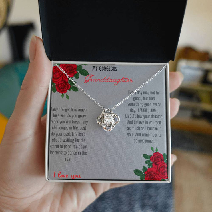 Love Knot Necklace with a white gold love knot in a two-tone box angle 2