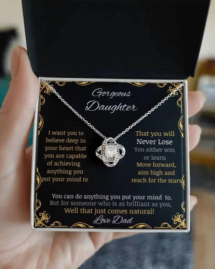 Love Knot Necklace with a white gold charm in a two-tone box angle 2