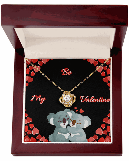 18k gold love knot necklace in a luxury box