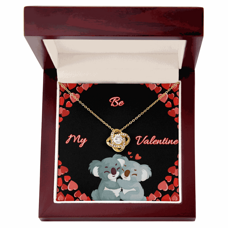 18k gold love knot necklace in a luxury box