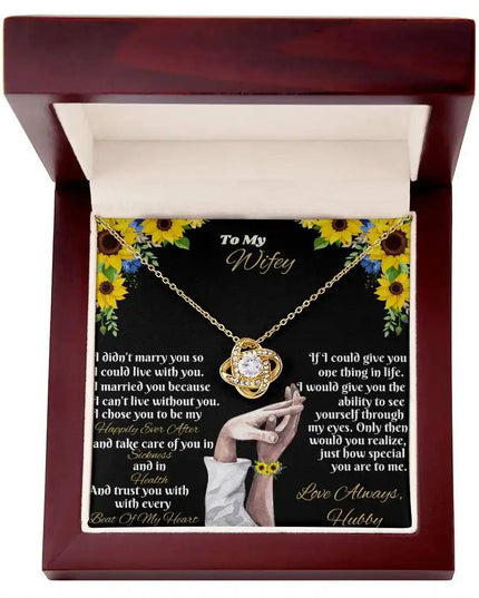 yellow gold love knot necklace in mahogany box