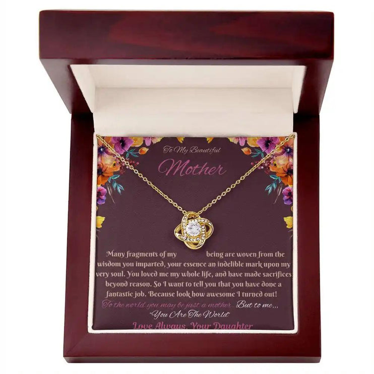 yellow gold love knot necklace in mahogany box