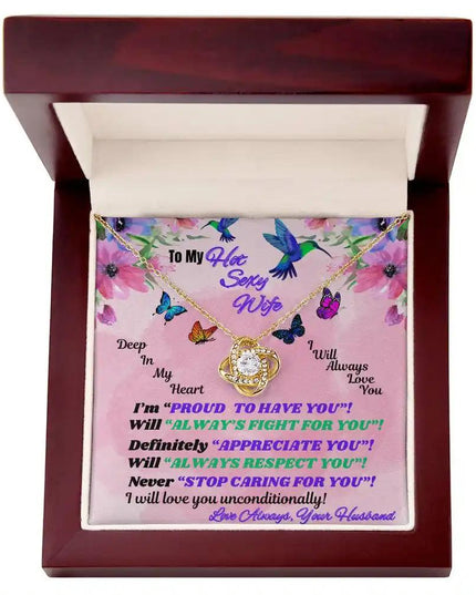 yellow gold love knot necklace in mahogany box