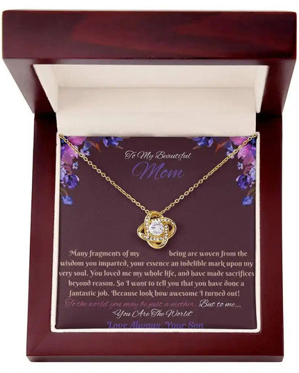 yellow gold love knot necklace in mahogany box