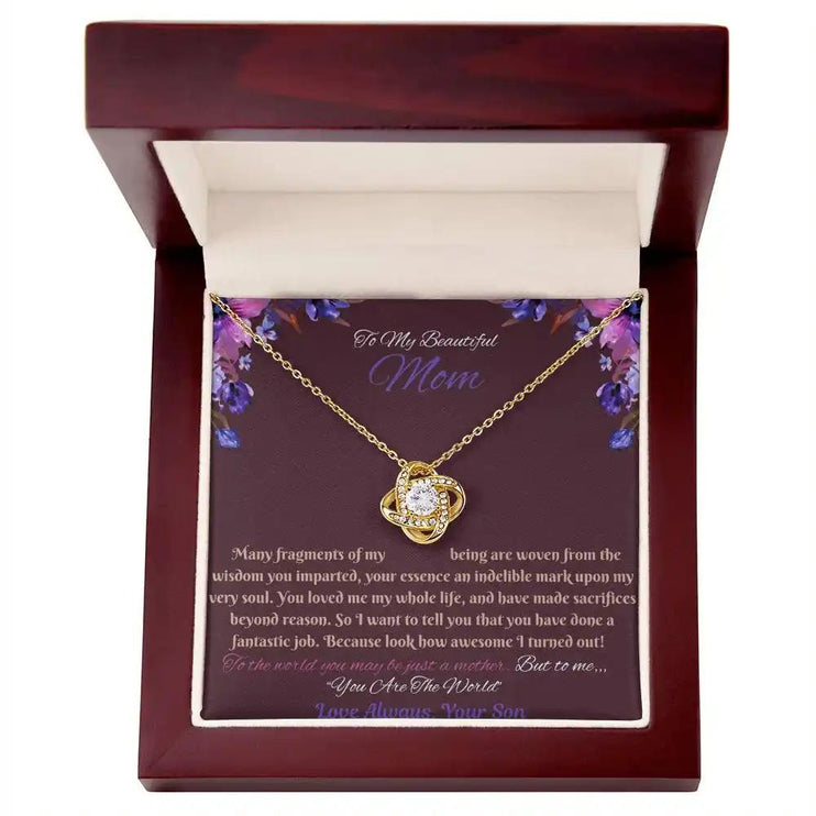 yellow gold love knot necklace in mahogany box