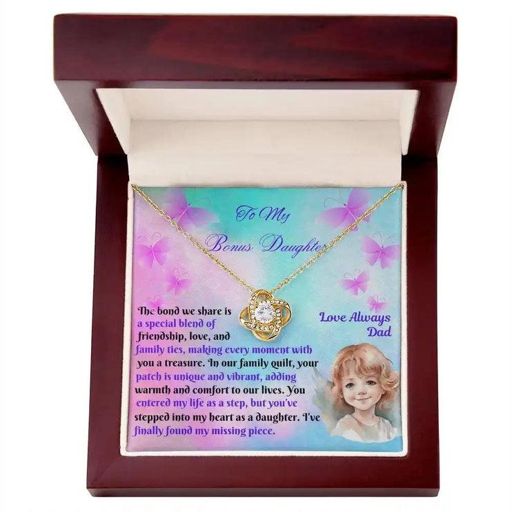 yellow gold love knot necklace in mahogany box