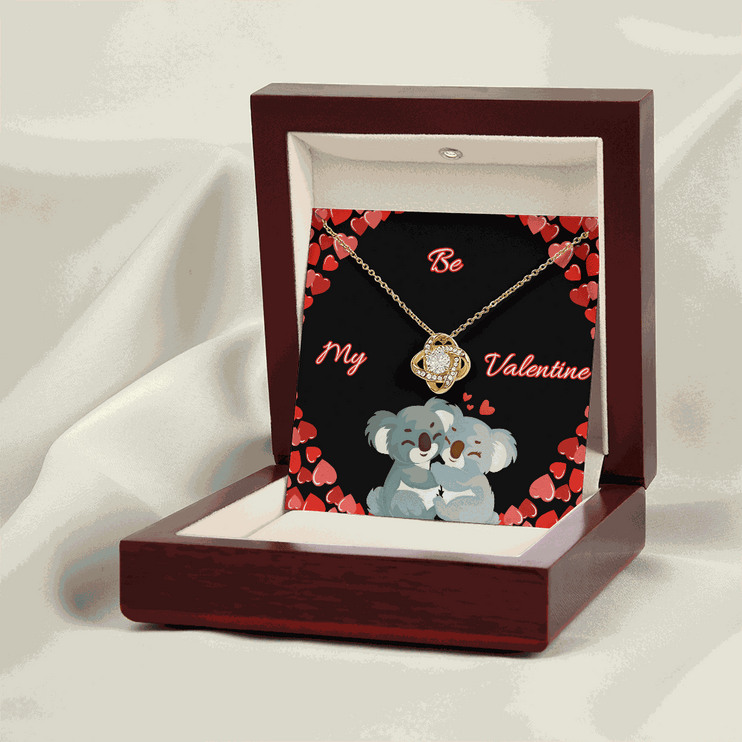 18k gold love knot necklace in a luxury box