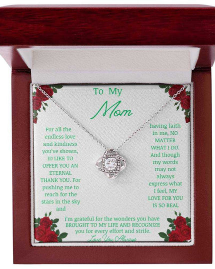 Love Knot Necklace with white gold pendant in a mahogany box angle 1