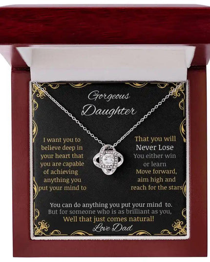 Love Knot Necklace with a white gold charm in a mahogany box angle 1
