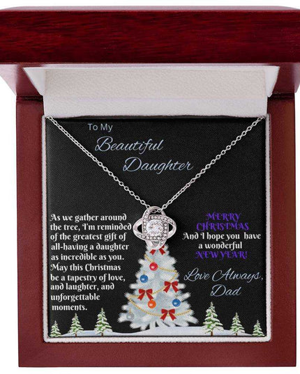white gold love knot necklace in luxury box birds eye view