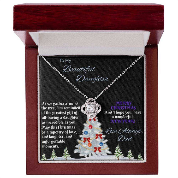 white gold love knot necklace in luxury box birds eye view