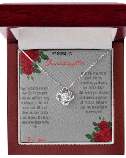 Love Knot Necklace with a white gold love knot in a mahogany box