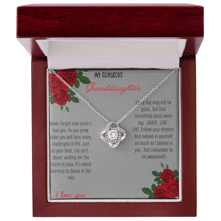 Love Knot Necklace with a white gold love knot in a mahogany box