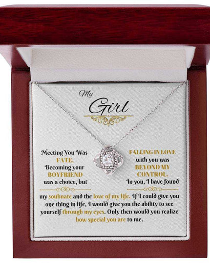 white gold love knot necklace in a luxury box up close