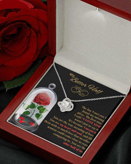 14k white gold love knot necklace in luxury box angled right