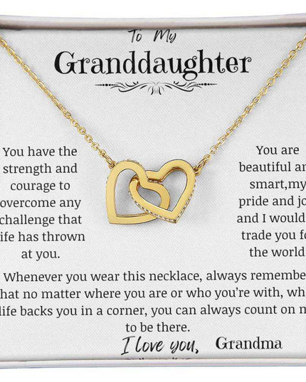 a yellow gold interlocking hearts necklace up close