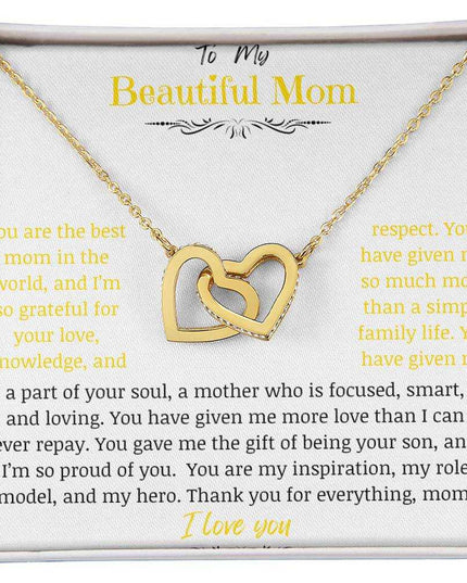 A gold gold interlocking hearts necklace up close