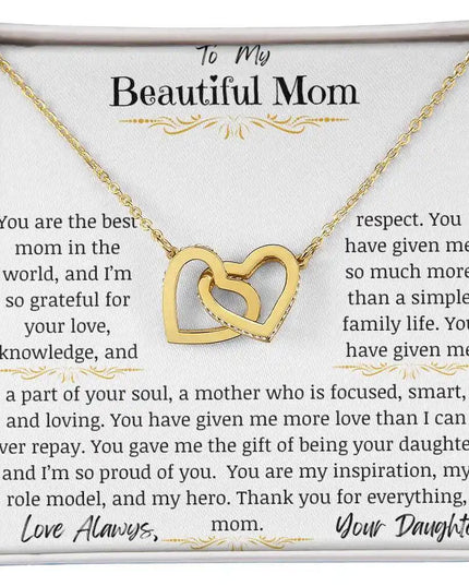 a yellow gold interlocking hearts necklace up close