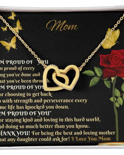 gold interlocking hearts necklace in a two-tone box up close