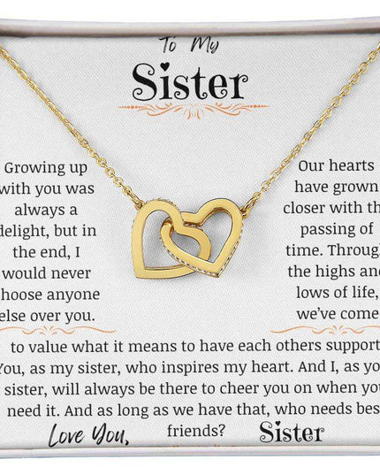 a rose gold interlocking hearts necklace up close