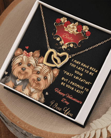 yellow gold interlocking hearts necklace in a soft box