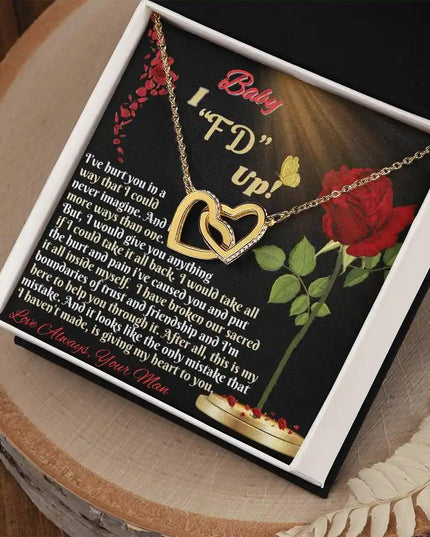 gold interlocking hearts necklace in two-tone box angled right