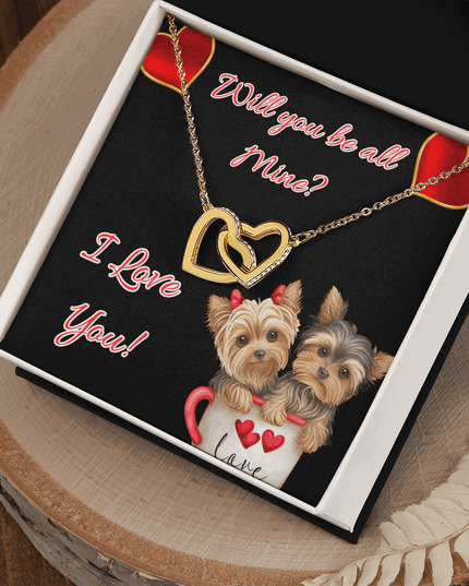 gold interlocking hearts necklace in a soft box