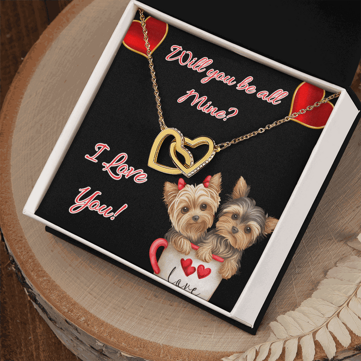 gold interlocking hearts necklace in a soft box
