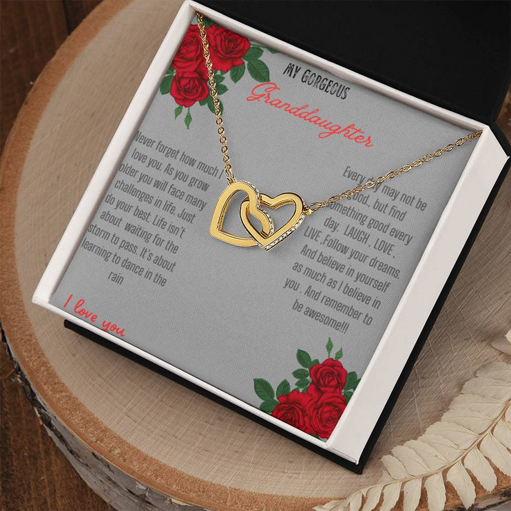 Interlocking Hearts Necklace with rose gold charm in a two-tone box angle 2