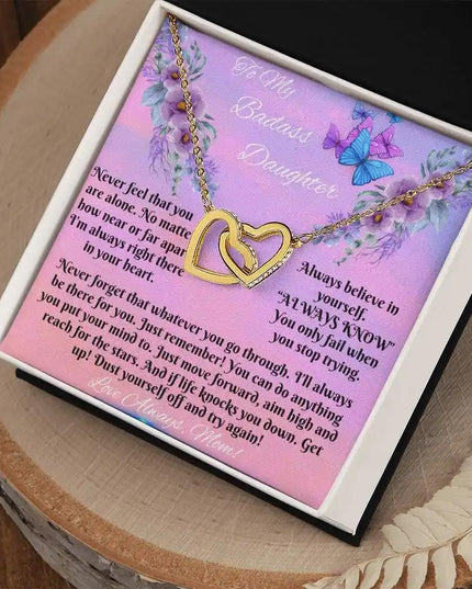 yellow gold interlocking hearts necklace in two-tone box angled right
