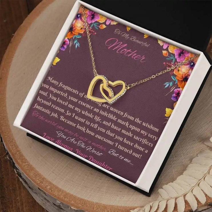 gold interlocking hearts necklace in soft box