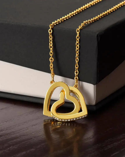 gold interlocking hearts necklace in two-tone box