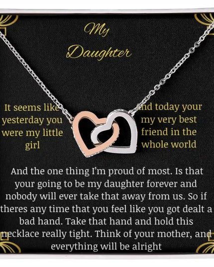 Interlocking Hearts Necklace with a rose gold charm in a two-tone box