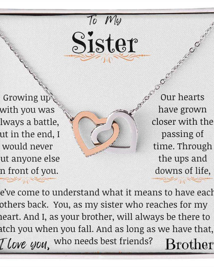 a rose gold interlocking hearts necklace up close