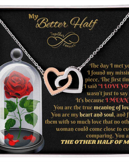 rose gold interlocking hearts necklace in soft box up close