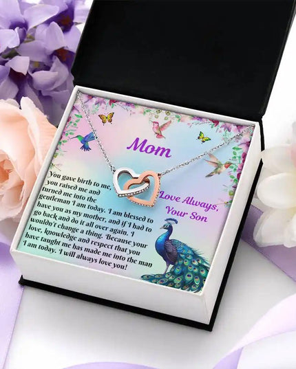 rose gold interlocking hearts necklace in two tone box angled right