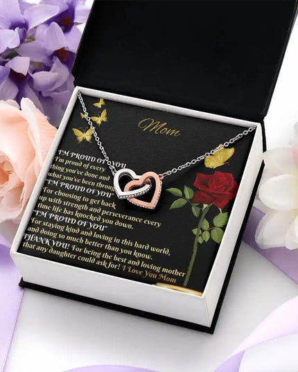 rose gold interlocking hearts necklace in two-tone box angled right